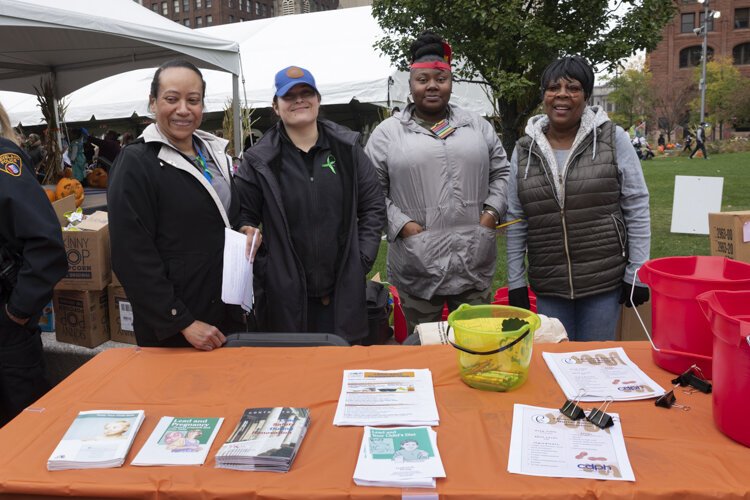 Cleveland Department of Public Health workers Linda Provitt-Robinson, Claudia Meister, Tyra Kirby and Charlotte Ford distribute lead poisoning information at a recent event in Public Square.