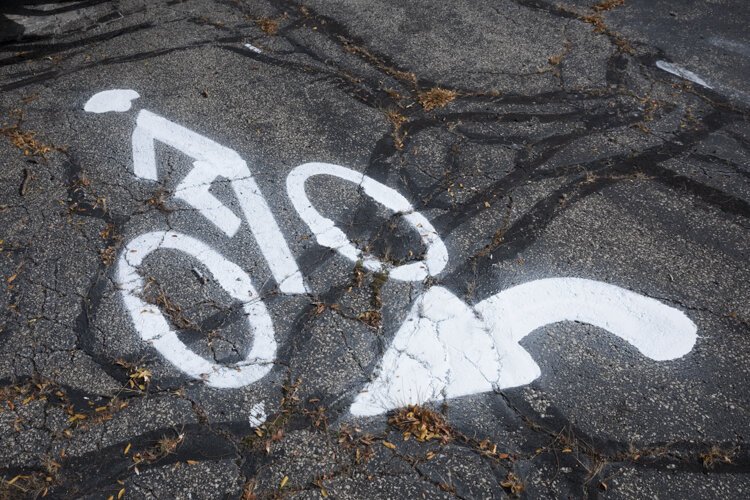 A bicyclist symbol and an arrow were printed at a recent test in Cleveland Heights.