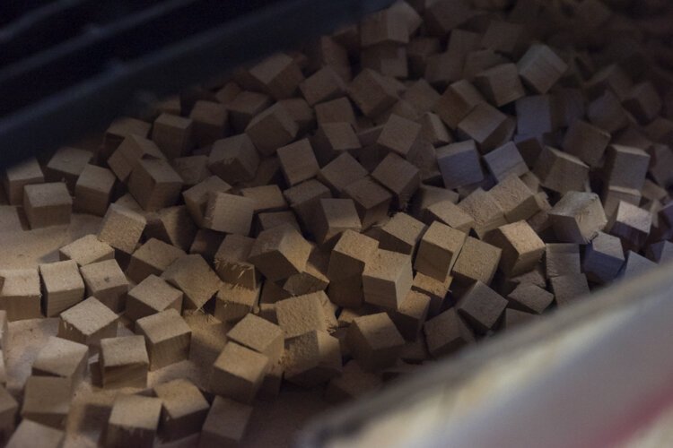 These perfect one-inch squares of wood at Cleveland Whiskey were cut by a robot built by MAGNET.