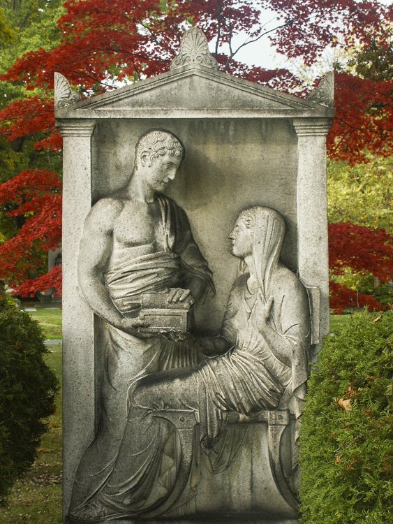 One of many beautiful sculptural headstones at Lake View Cemetery.