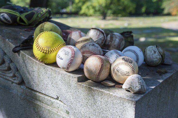 Visitors still leave baseballs at the grave of Cleveland Indians shortstop Ray Chapman, killed by a pitch in 1920.