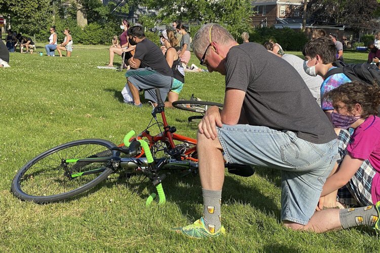 Student-organized Lakewood Kneel In at Lakewood Park.