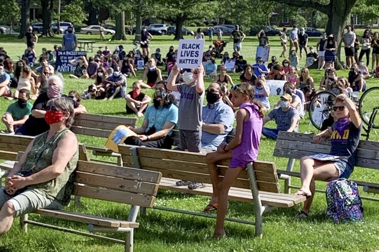 Student-organized Lakewood Kneel In at Lakewood Park.