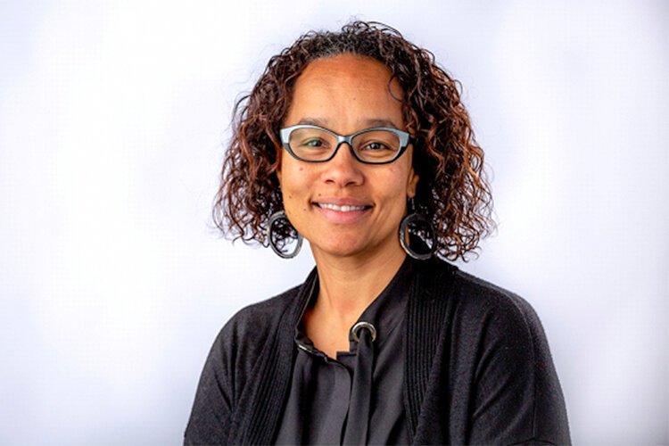 Michele Andrasik, a scientist with expertise in infectious diseases and vaccines, has been a part of the effort to use lessons from HIV/AIDS research to help educate and earn trust in communities that might be reluctant to help take or use vaccines b