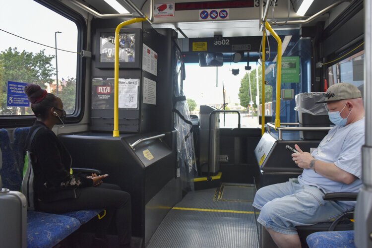 A few riders inside a Greater Cleveland RTA bus back in September.