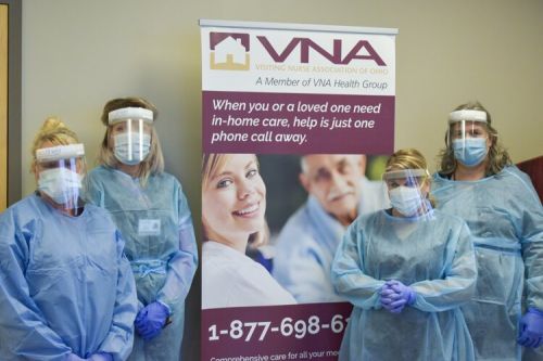 The members of the Visiting Nurse Association of Ohio’s COVID-19 swat team assemble in the lobby of the VNA Ohio offices in Brooklyn Heights. They test and care for COVID-19 positive patients, and suspected cases, in their own homes.