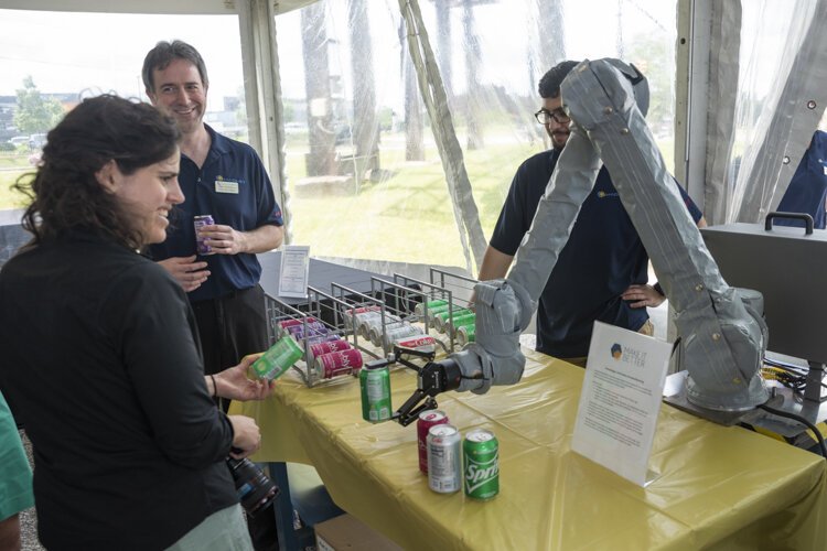 MAGNET Launch Event attendees were served drinks by a robotic arm.