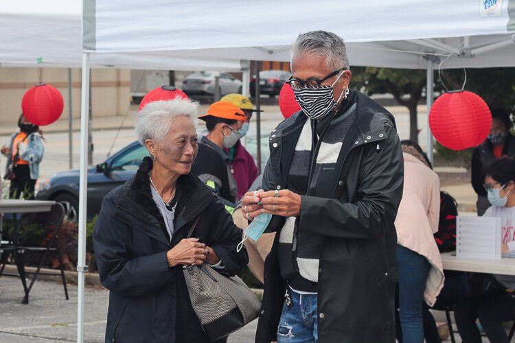 MidTown Cleveland Mid-Autumn Festival voter registration booth. The screenshots are relevant because they are from various