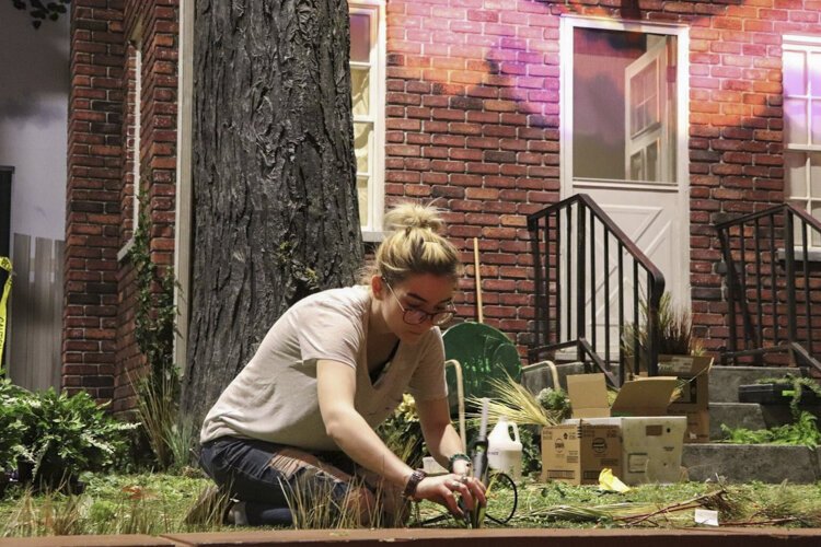 CPH Scenic Artist Megan Walsh prepares the set of Playhouse Square’s ‘The Choir of Man