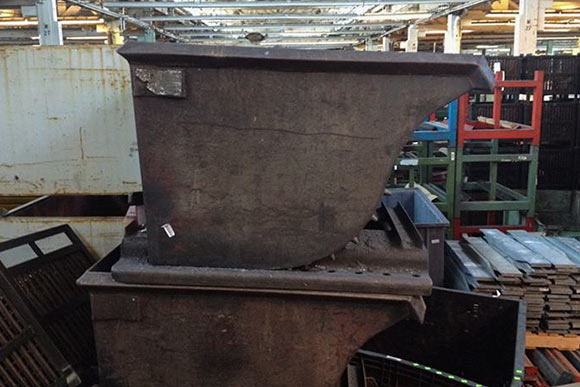 Industrial hoppers that are being used in the bench’s construction