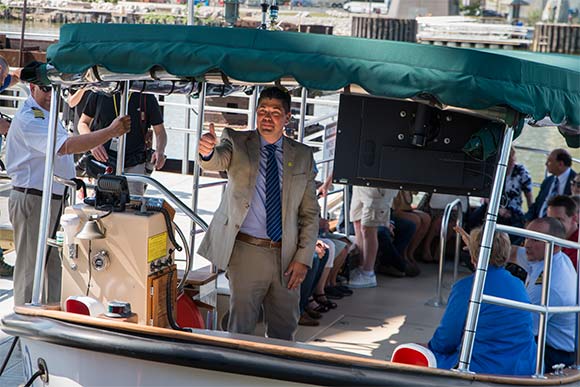 Cleveland Metroparks Chief Executive Officer Brian Zimmerman ready to shove off on the inaugural Water Taxi ride