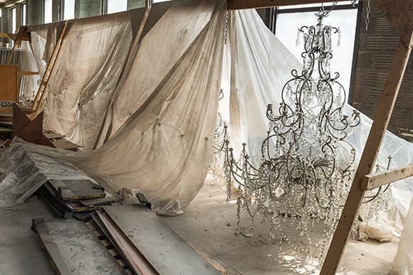 The original chandeliers await restoration in storage at the Higbee bldg.