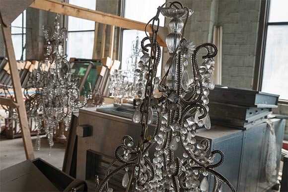 <span class="content-image-text">The original chandeliers await restoration in storage at the Higbee bldg.</span>