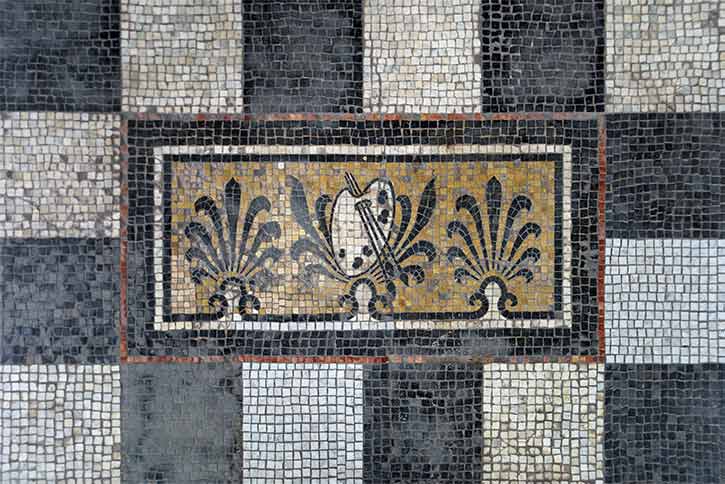 The mosaic tile floor restored on the art gallery front porch