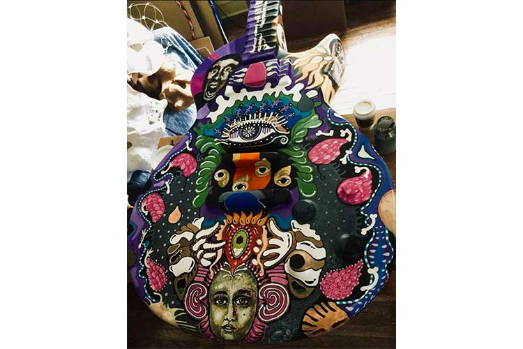 Giant painted guitar by artist Rafael Valdivieso Troya