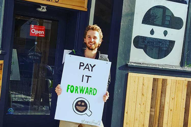 CoffeeQ cofounder Sebastian Thimmig in front of Beviamo Cafe