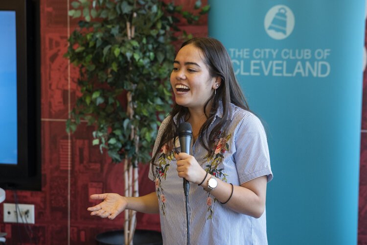 Julia Wang of the City Club introduces the forum discussion at PNC Fairfax Connection