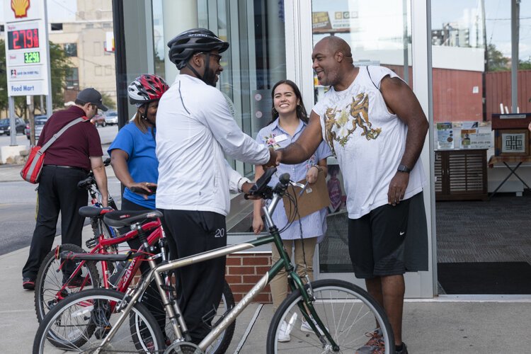 Councilman Blaine Griffin - Ward 6 greets a rider before the Fairfax neighborhood bike tour