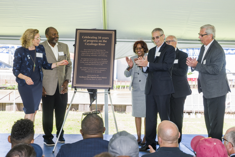 Dedication plaque reveal at the Towpath Trail Groundbreaking