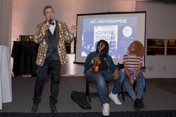 Chris Axelrod serves as the urbane master of ceremonies at #GivingTuesdayCLE 2018.