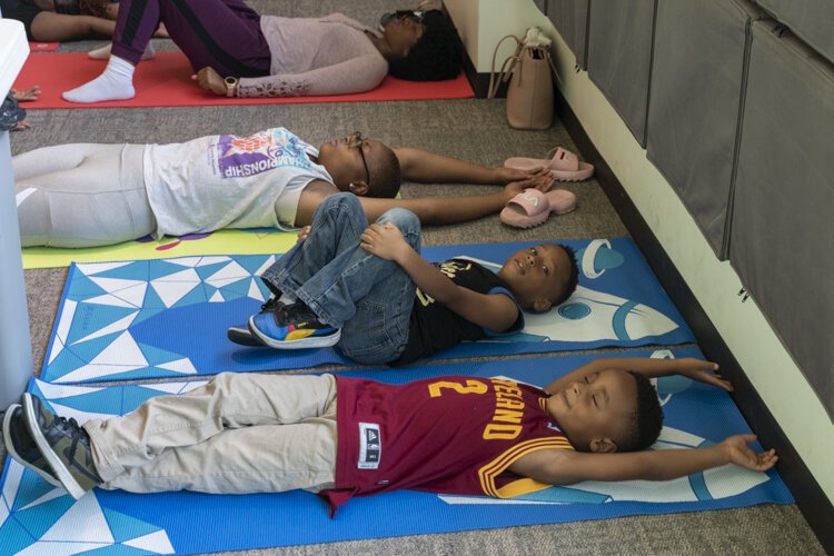 Kids get into the yoga classes at the PNC Fairfax Connection.