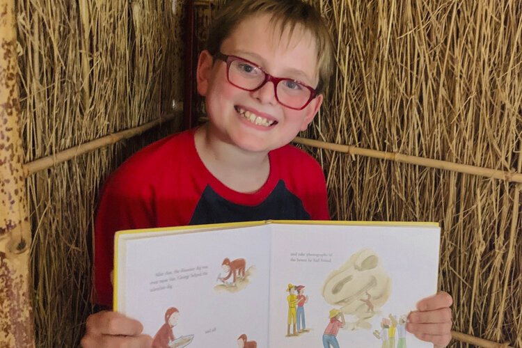 Fifth grader Auty Mayer read “Curious George at the Aquarium” by H.A. Rey.