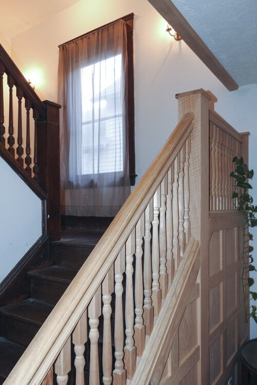 Daisy Avenue home staircase after renovations.
