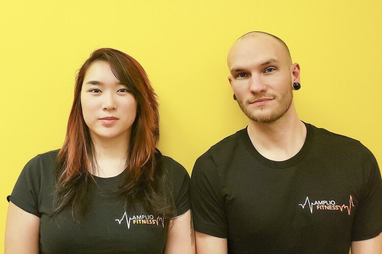 Belle Ursa, co-founder of Amplio Fitness, and her business partner John Hall.