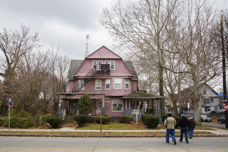 This men's shelter, a renovated crack house, is across the street from the Manna House.