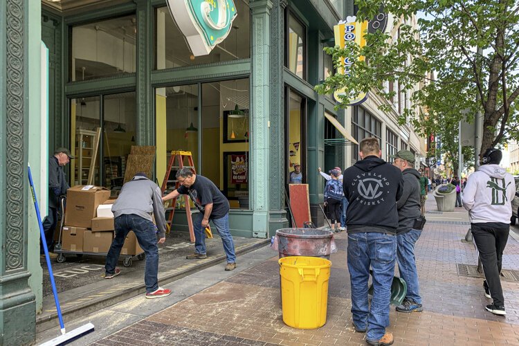 Clean up after the rioting in downtown Cleveland.