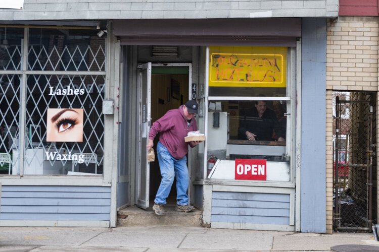 One of the last customers at Old Fashion Hot Dogs in March of 2020.