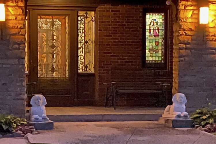 Brown Knot, sphyx, and stained glass at the 201St Street Estate.