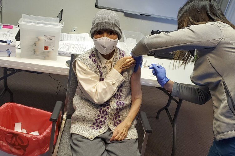 Betty Lee got her vaccine at ASIA, Inc.’s International Community Health Center in Akron earlier this year. She is the mother of Dr. Amy Lee, ASIA’s board president.