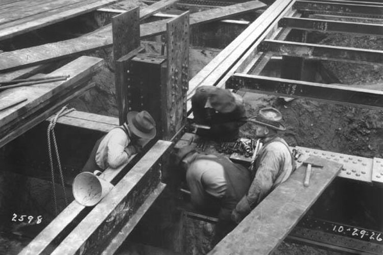 Rivet gang driving the first rivet in the Tower building - 1926