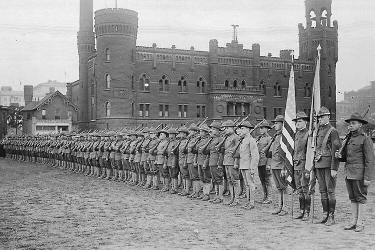 Soldiers stand in formation at Central Armory during World War I. 