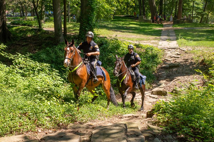 Police Mounties patrolling in the Cleveland Cultural Gardens.