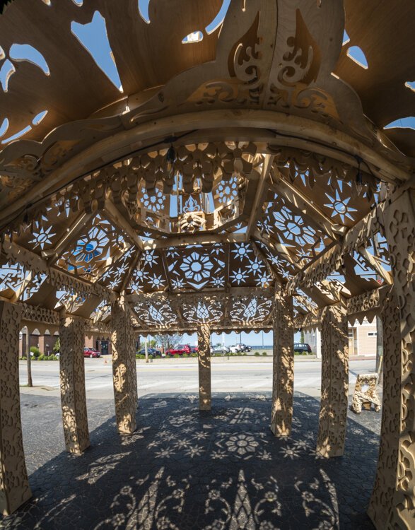 Ascent: One's journey to the heavens through ornate floral and geometric woodwork. Located at 43rd and Detroit by artist/designer/engineer/Builder Dave Biro.